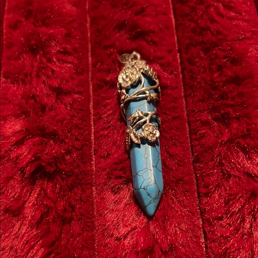 Turquoise Pendant with Floral Design